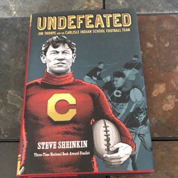 Undefeated: Jim Thorp and the Carlisle Indian School Football Team-Hardback - Picture 1 of 5
